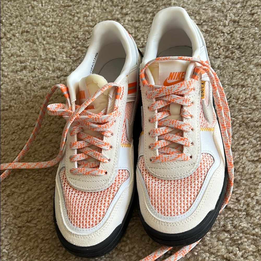 Nike mens Orange and Ivory Sneakers